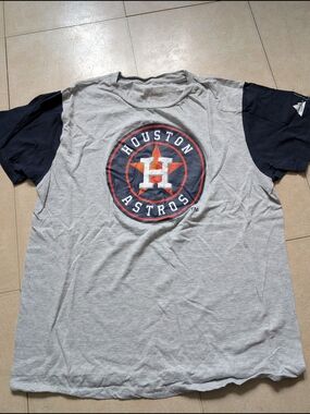 Genuine Merchandise Gray Tee with Navy and Orange Logo